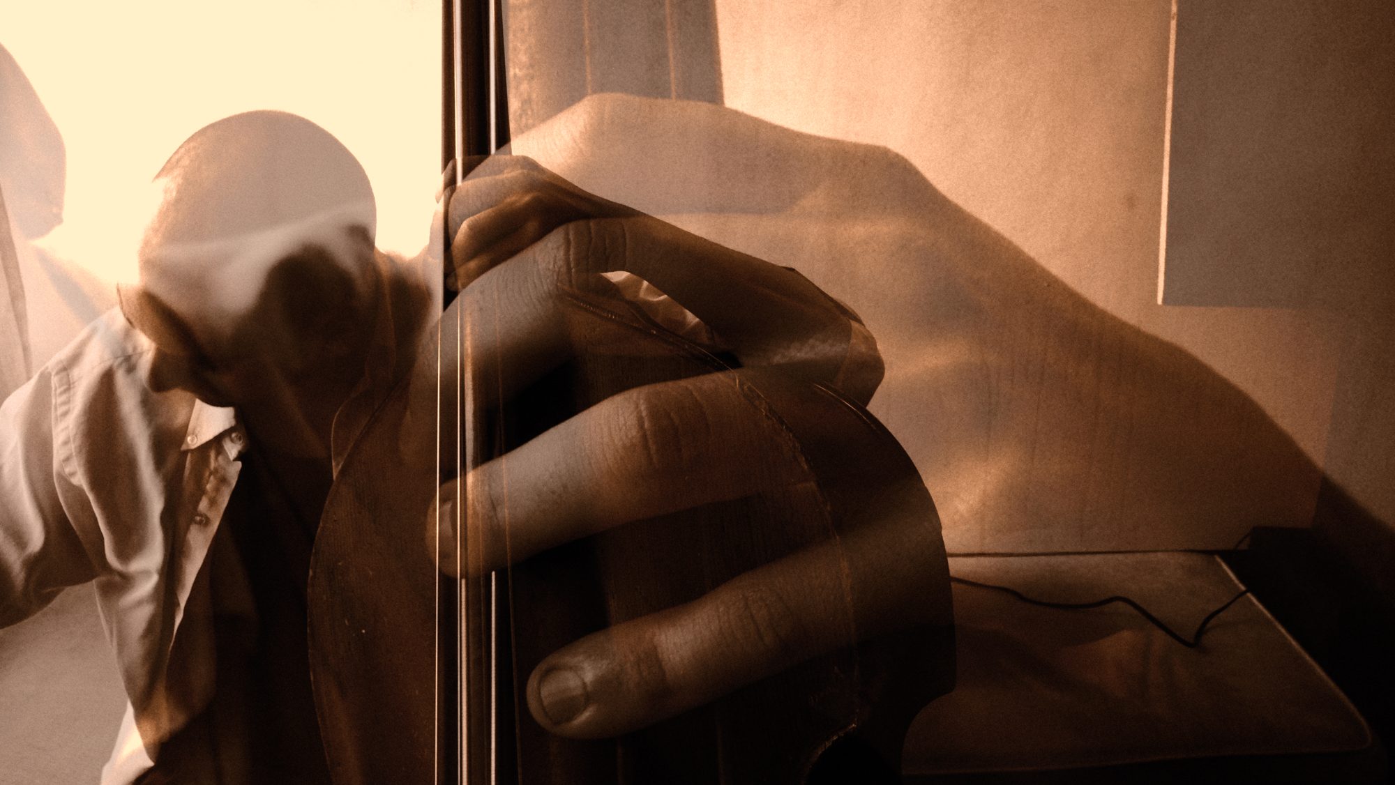 Connor Schultze and his double bass, double exposure